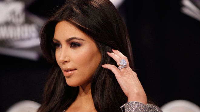 NEW YORK Newlyweds Kim Kardashian and Kris Humphries did not watch their 