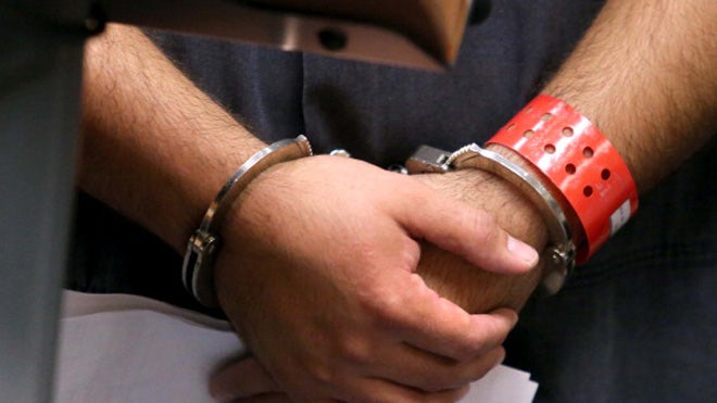 Man in hand cuffs.jpg
