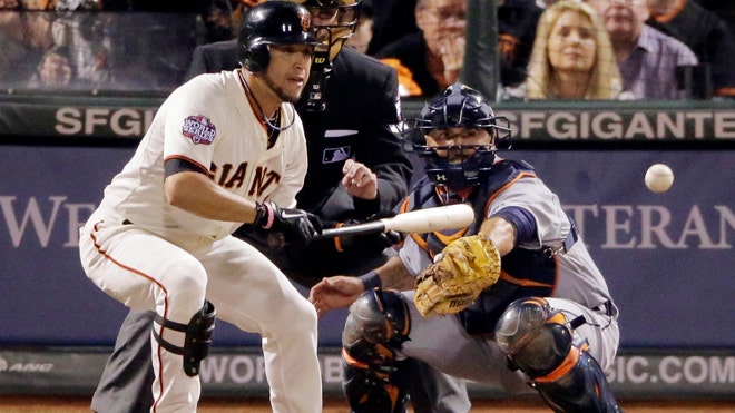 San Francisco Giants' Gregor Blanco bunts to load the bases during the ...