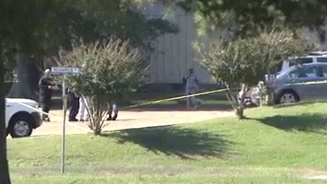 2 injured, suspect in custody after shooting outside Tennessee ...